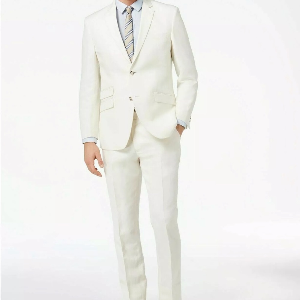 White linen suit by Perry Ellis.